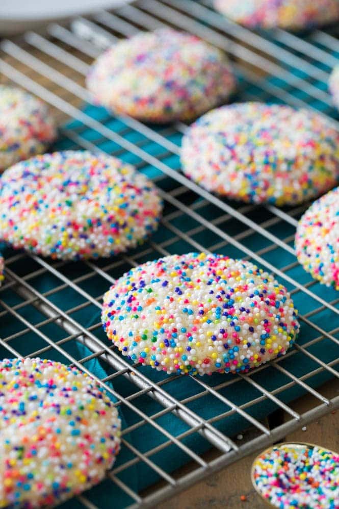 Sprinkle cookies cooling on cooling rack