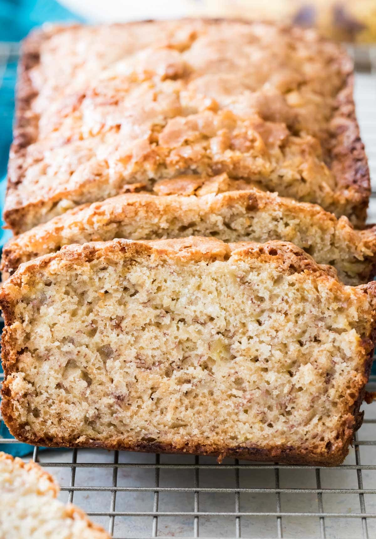 sliced banana bread on cooling rack