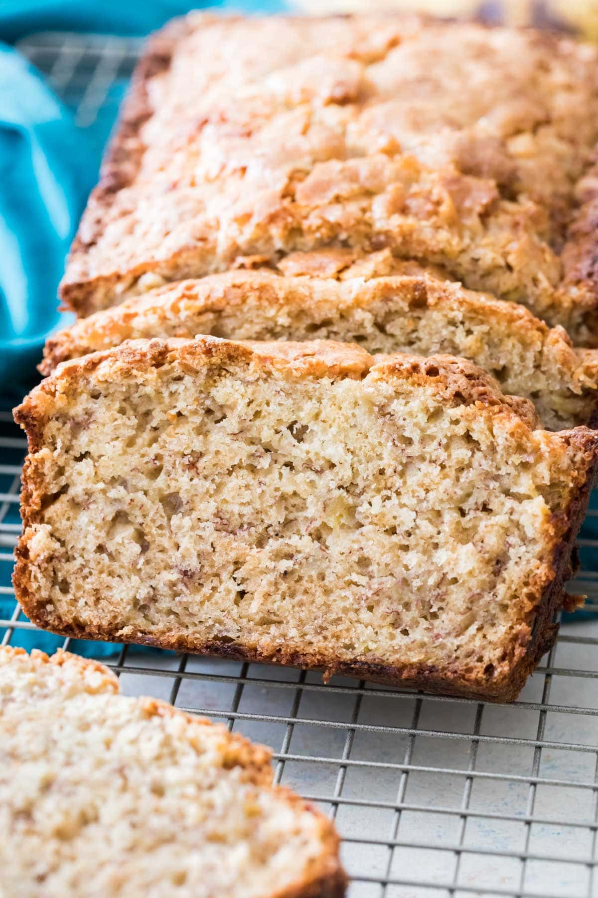 sliced banana bread on cooling rack