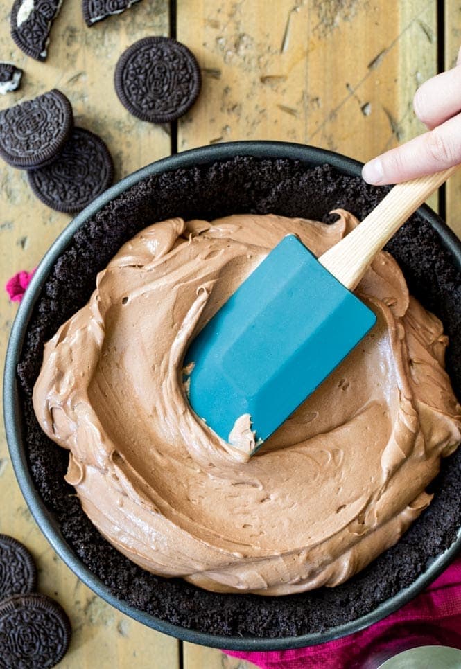 How to make Chocolate Icebox Pie: Spreading filling into prepared pie crust