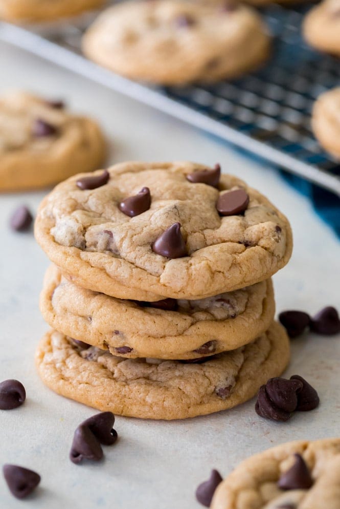 Stack of pudding cookies beside cooling rack