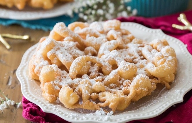 Funnel cake that's been dusted with powdered sugar