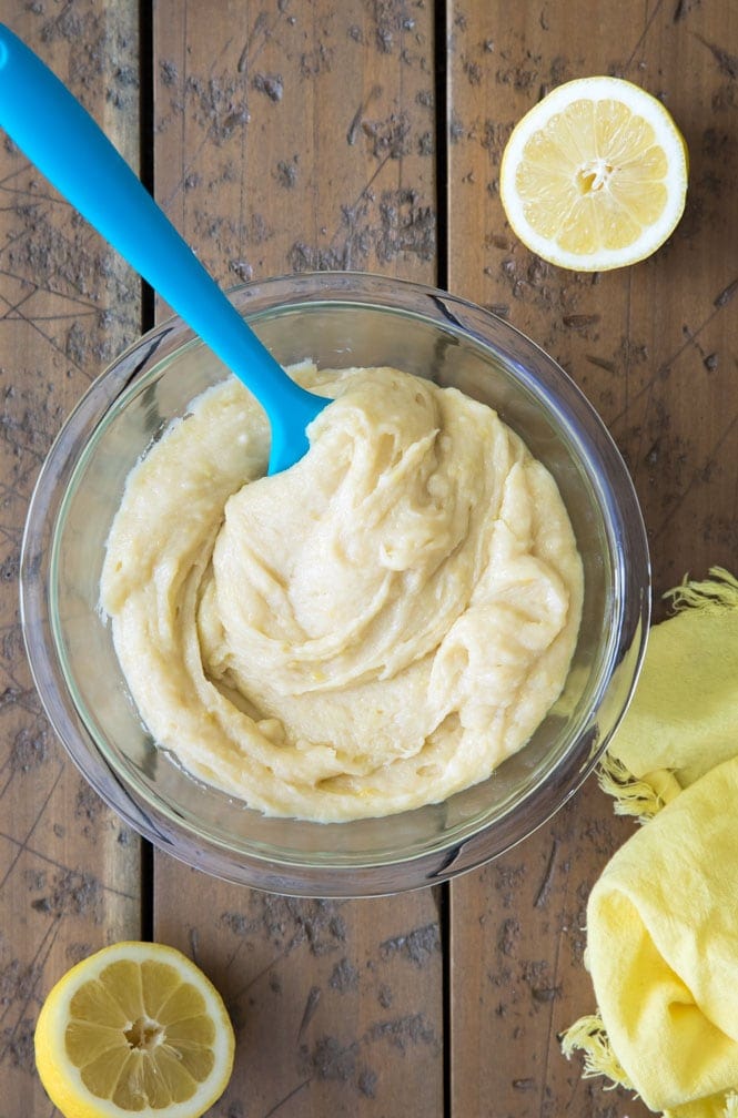 How to make lemon brownies: mixing batter in glass bowl