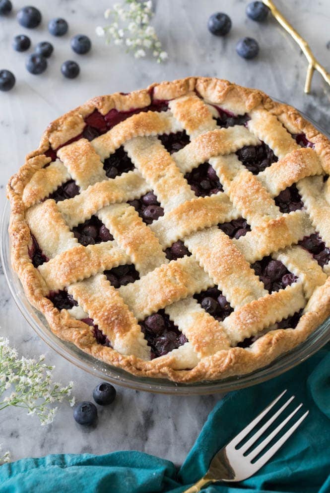 blueberry pie after baking on marble