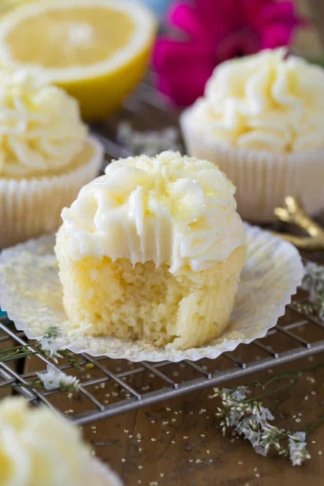Bite shot of lemon cupcake: showing soft fluffy interior