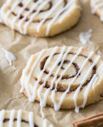 cinnamon roll cookies on parchment paper
