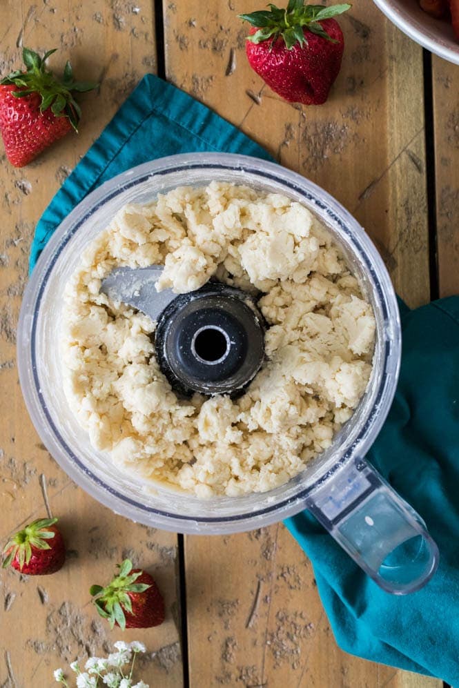 Making strawberry cobbler topping in food processor