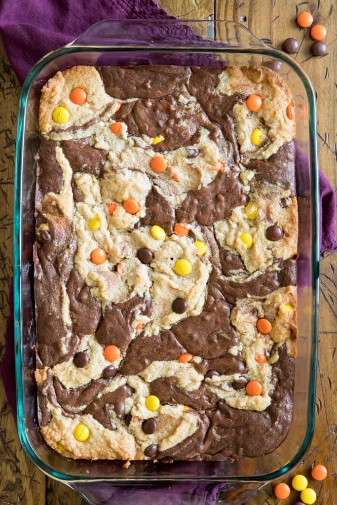 Glass pan with peanut butter brownies (topped with Reese's Pieces candy)