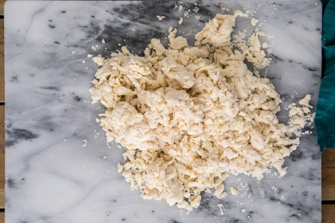 Transferring puff pastry dough to clean surface