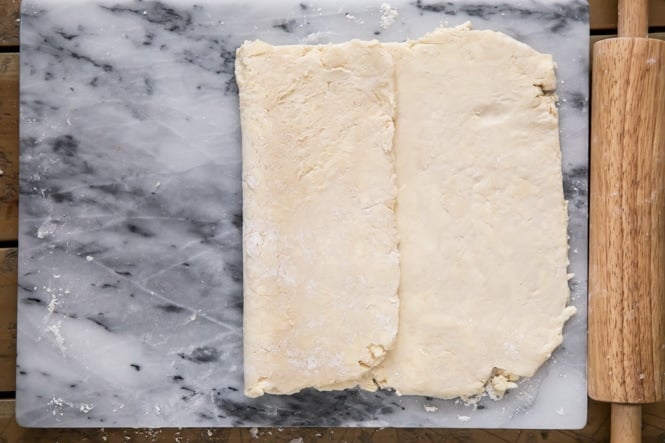 Folding over puff pastry dough like a letter