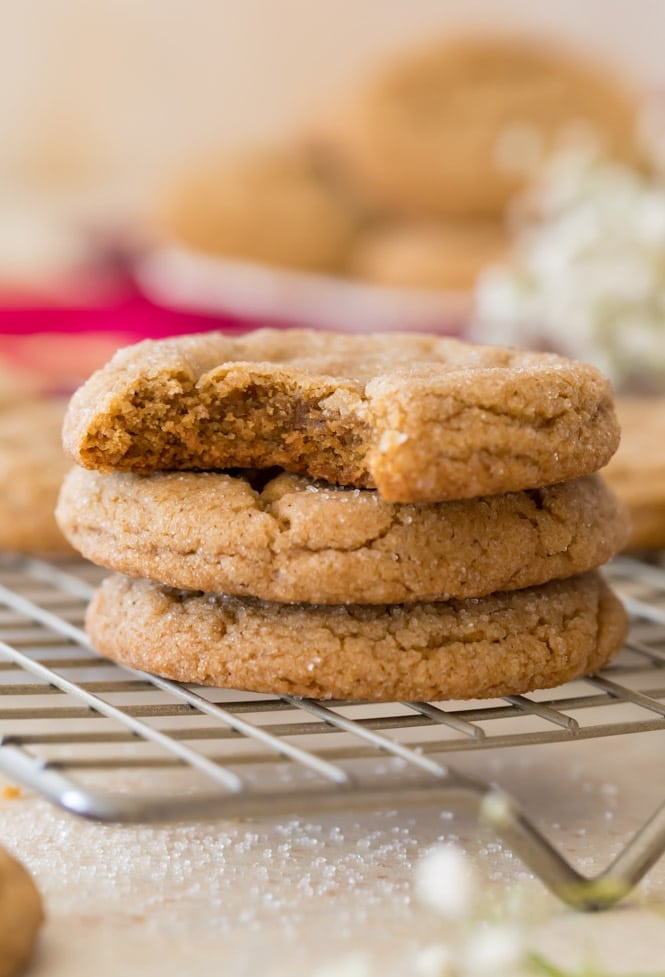 Stack of 3 soft gingersnap cookies on cooling rack