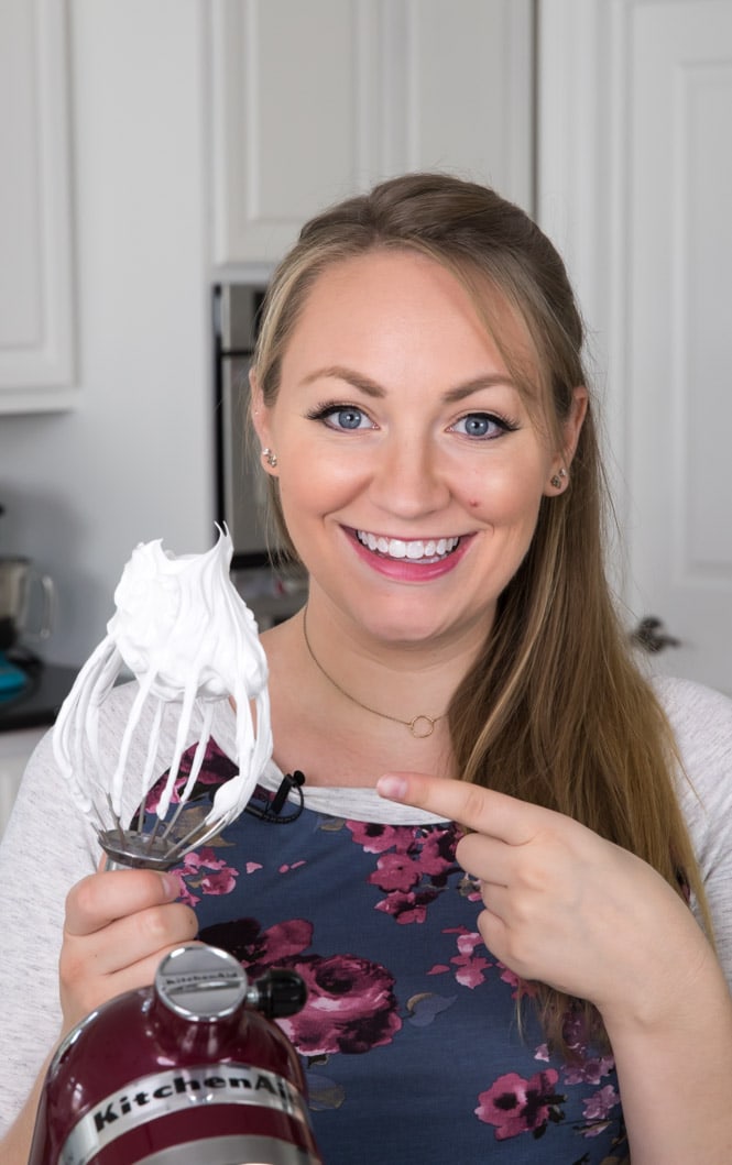 Whipping meringue to stiff peaks: showing stiff peak on whisk