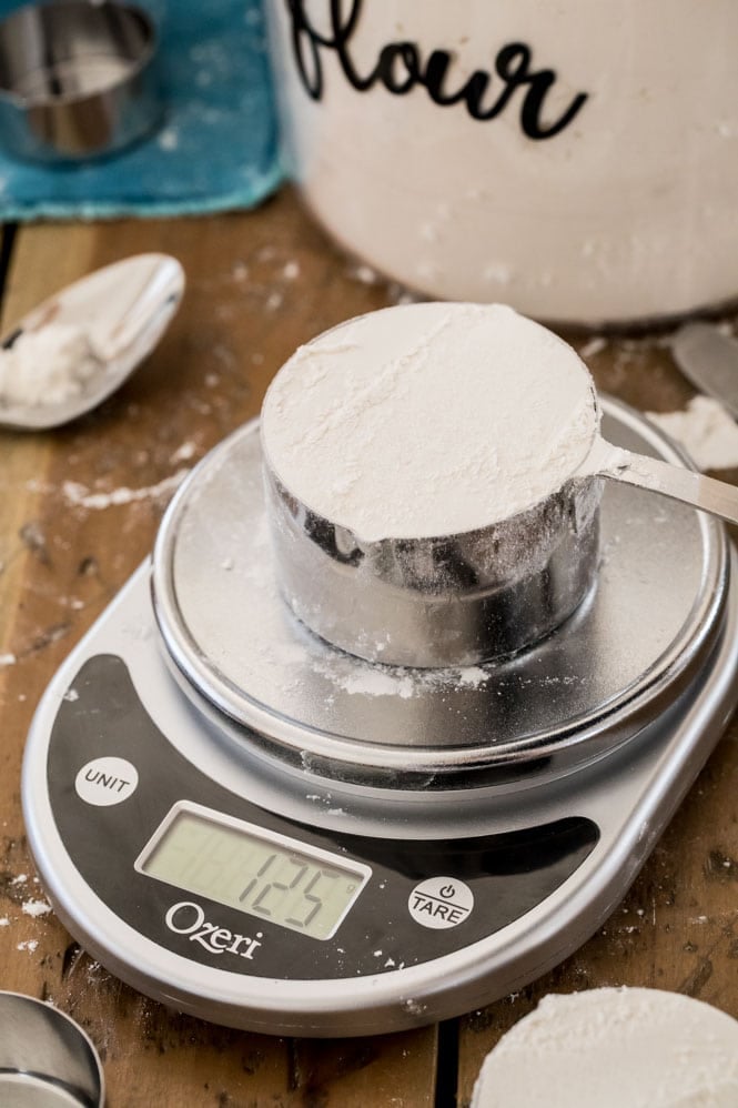 Flour that's been measured properly on a scale (showing 125grams for a cup)