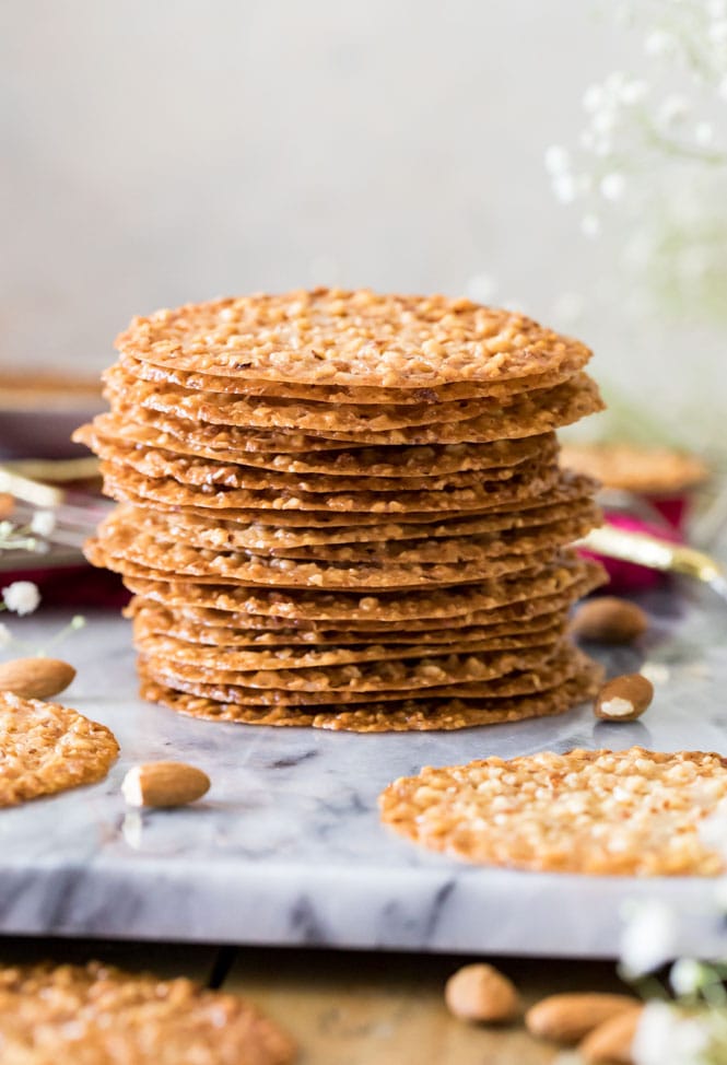 Stack of lace cookies on marble