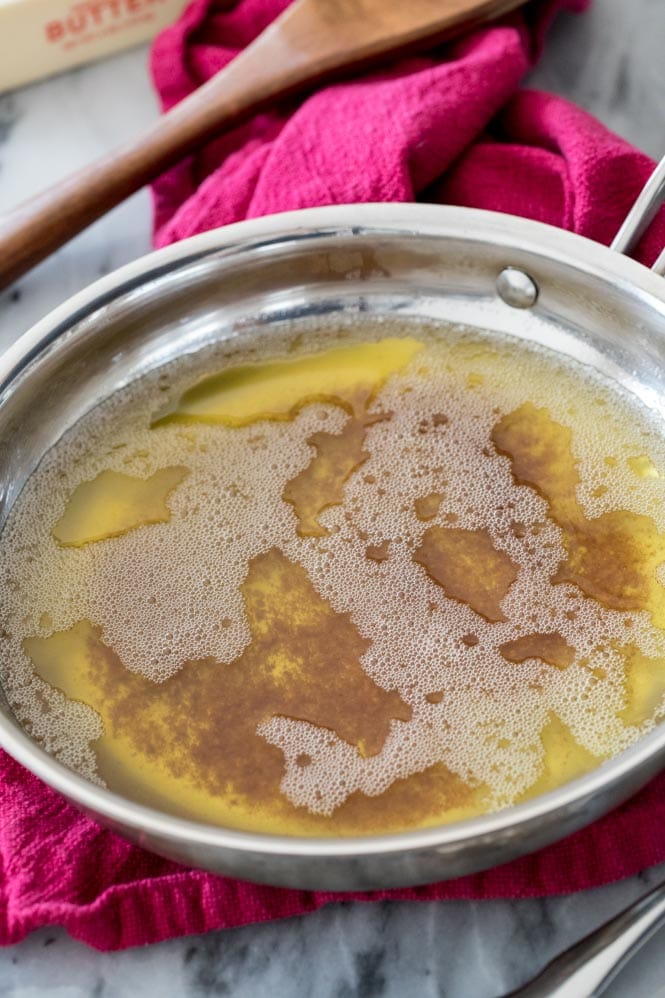 Browned butter in light-colored saucepan, showcasing the finished product