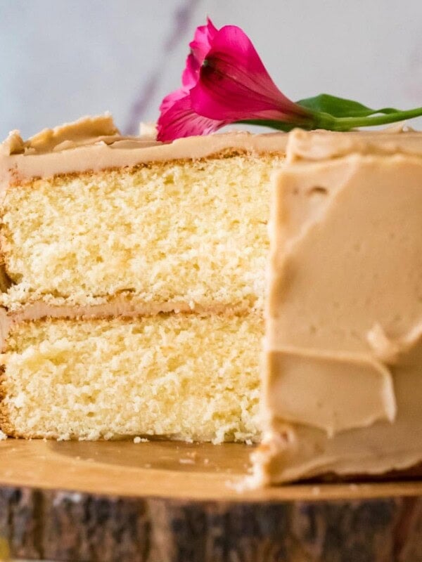 caramel cake with slice taken out