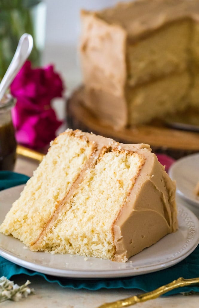 slice of caramel cake on white plate