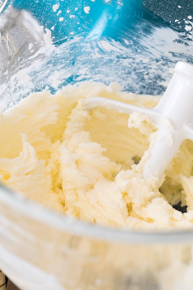 frosting before adding cream in glass bowl