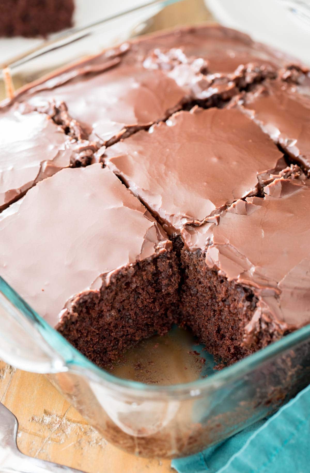 crazy cake in glass dish with slice taken out