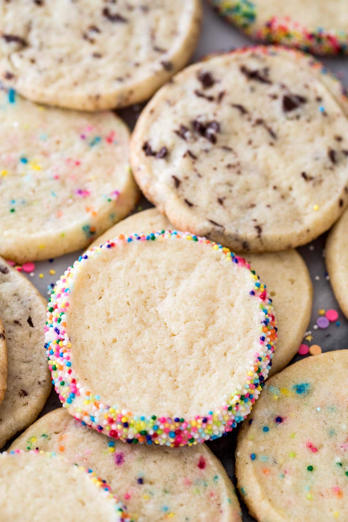 Cookies rolled in sprinkles and mixed with chocolate