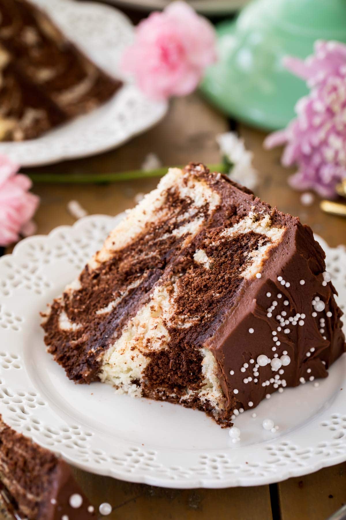 Marble cake with bite taken out on white plate