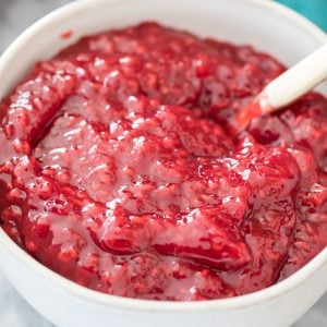 raspberry cake filling in white bowl