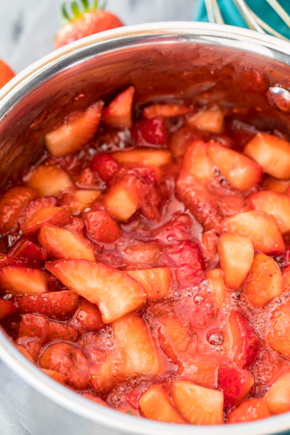 fresh strawberry sauce in saucepan