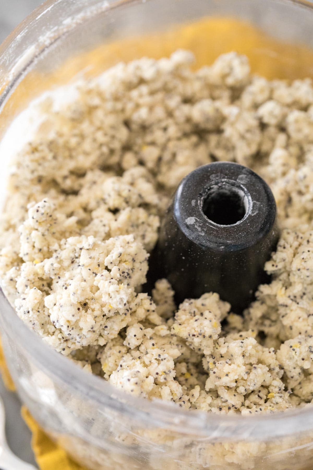 close up of scone dough in food processor