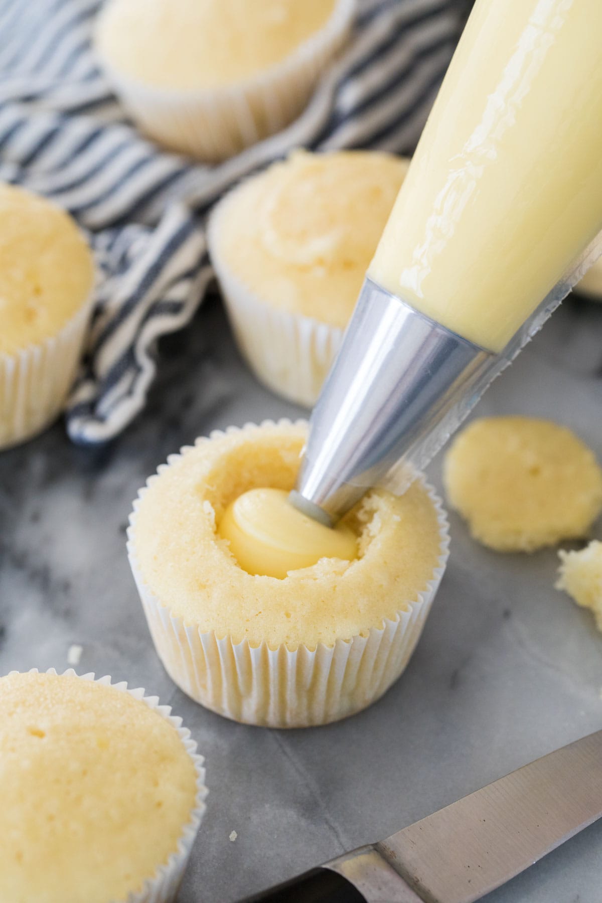 filling cupcake with pastry cream