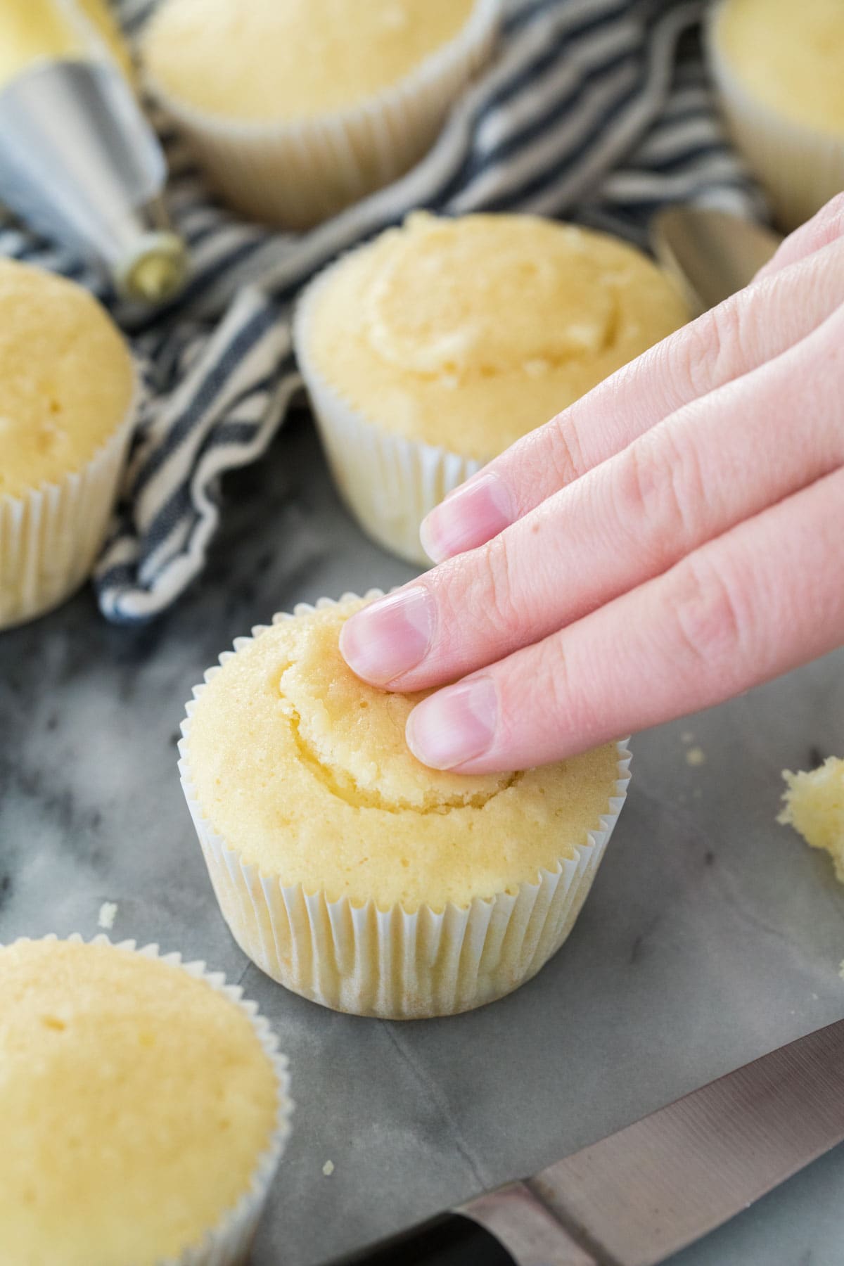 covering hole in vanilla cupcake