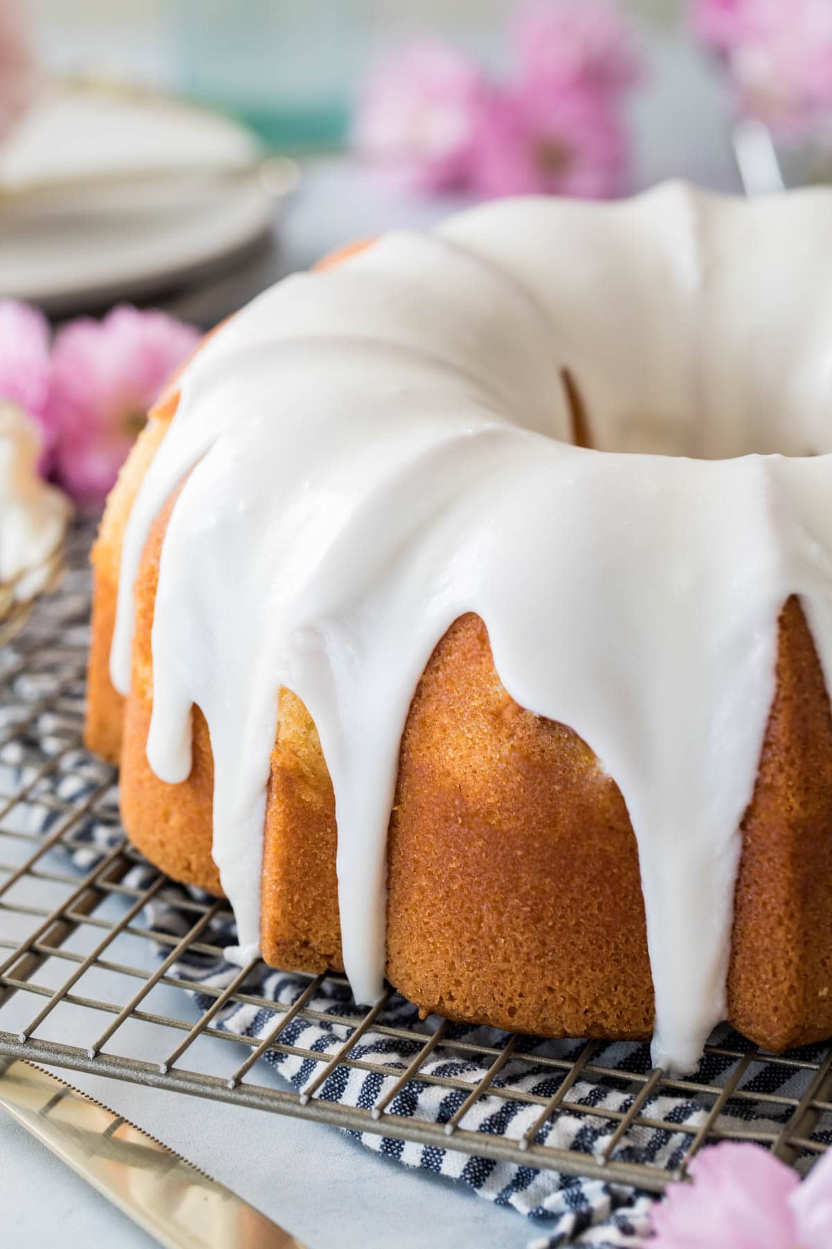 glazed bundt cake on cooling rack