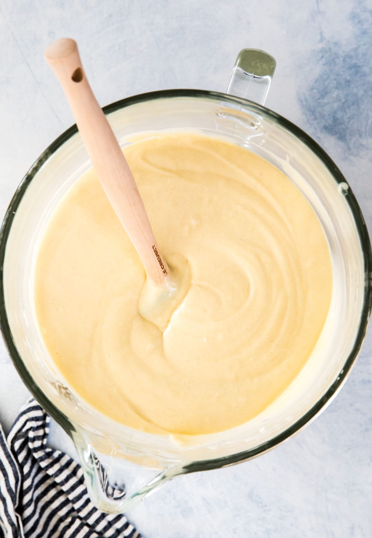 overhead of bundt cake batter in glass bowl