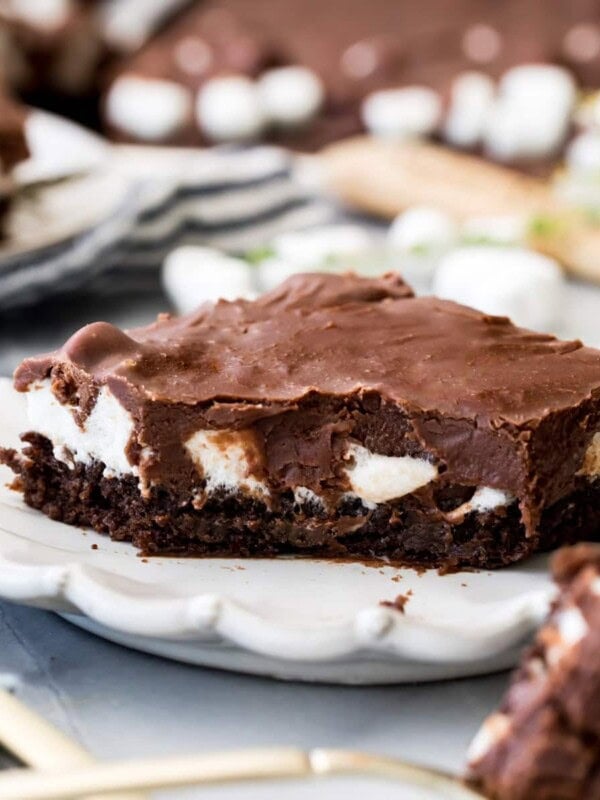 mississippi mud cake on white plate with forkful cut out