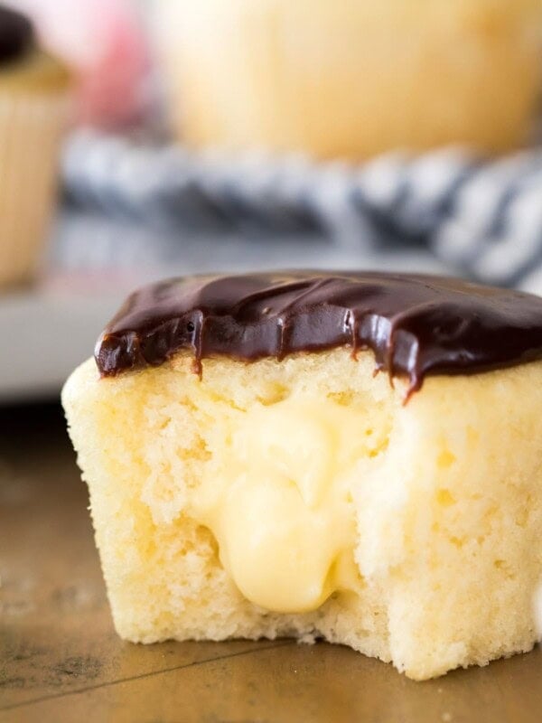 Boston cream cupcake with vanilla cream center