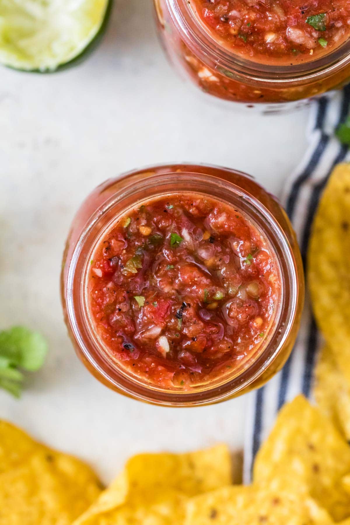 overhead of my salsa recipe in a mason jar