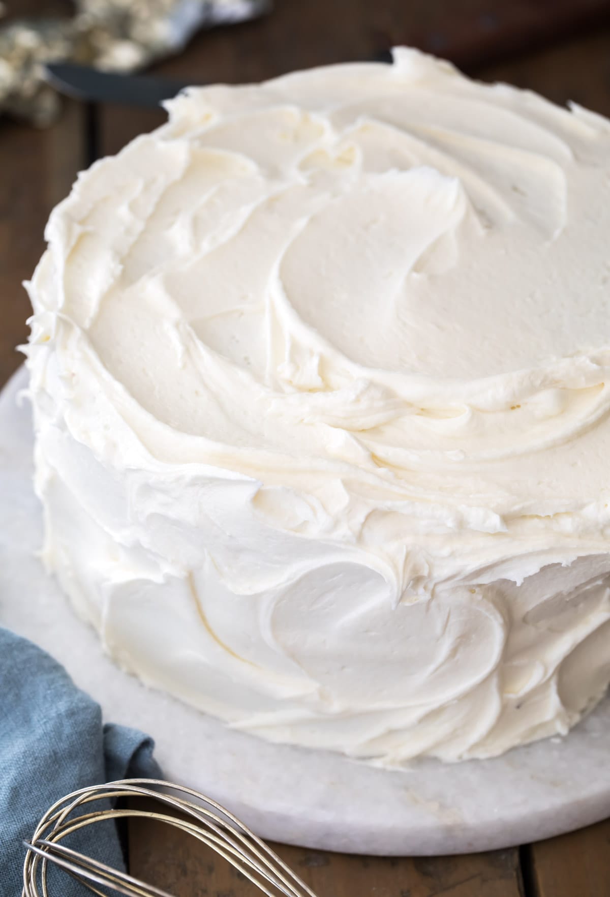 cake covered with white frosting