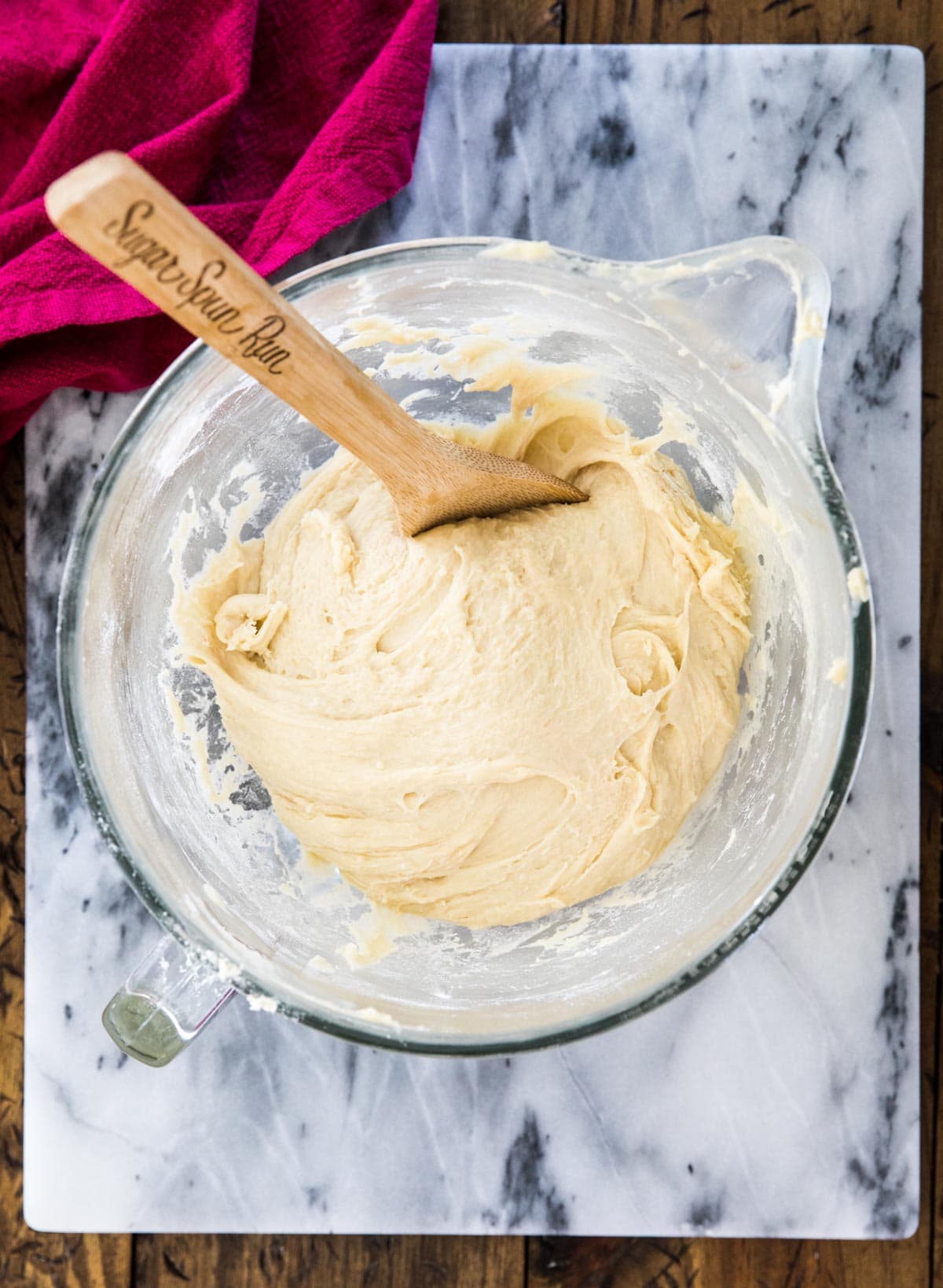 smooth elastic dough in glass bowl