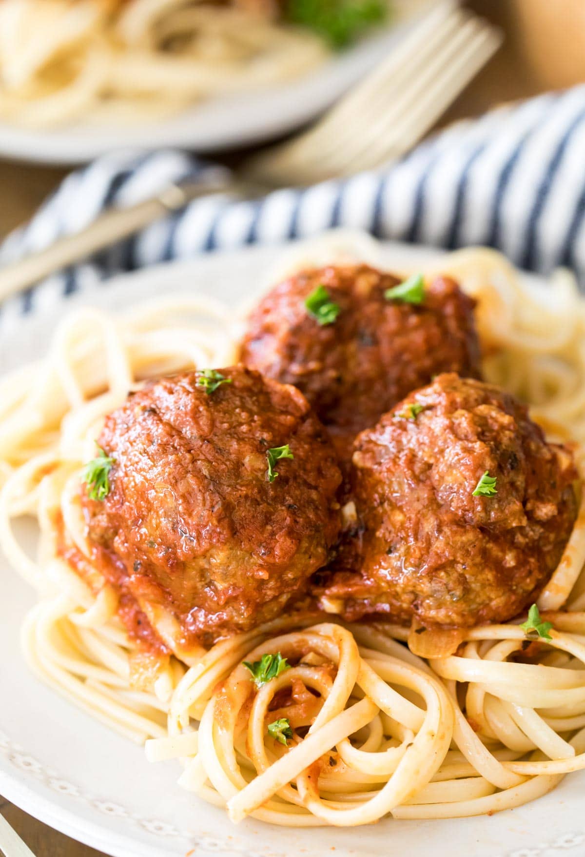 meatballs on white plate with pasta