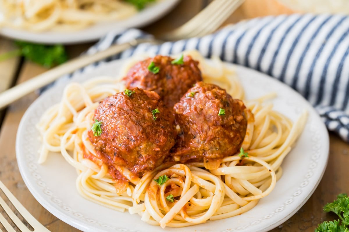 meatballs on white plate with pasta