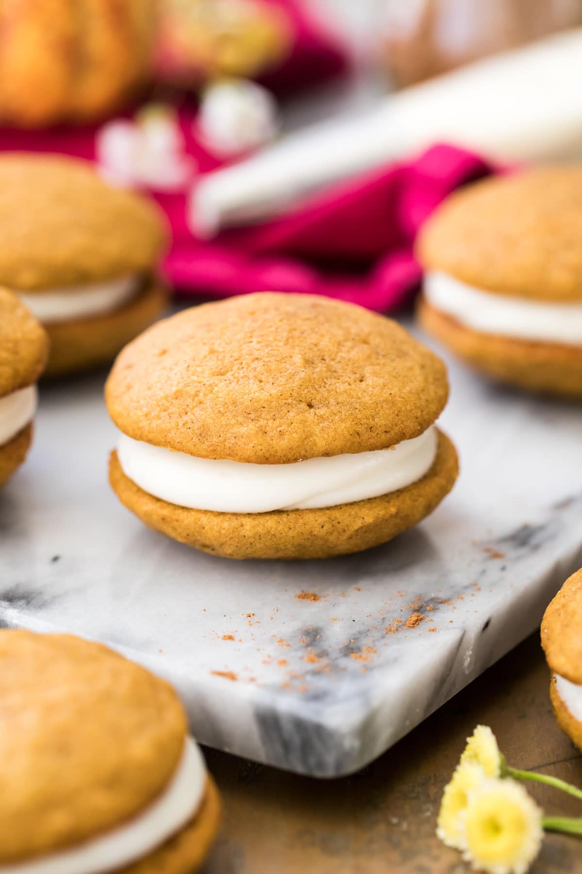 pumpkin whoopie pie on marble board