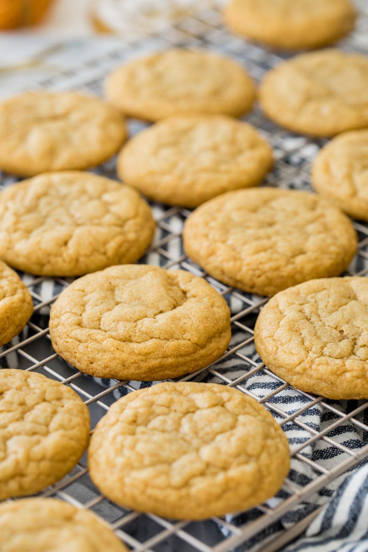 unfrosted pumpkin cookies on cooling rack