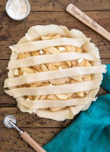 5 strips of pie dough over filling