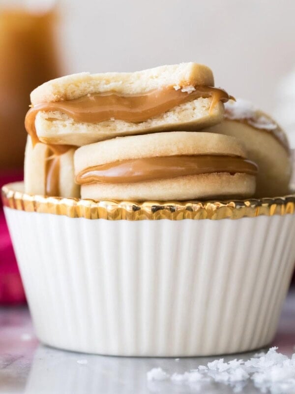 stack of alfajores in white cup