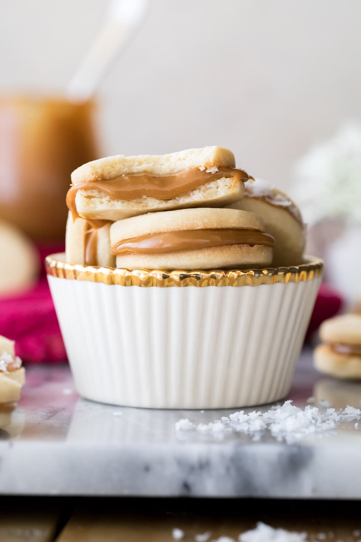 stack of alfajores in white cup