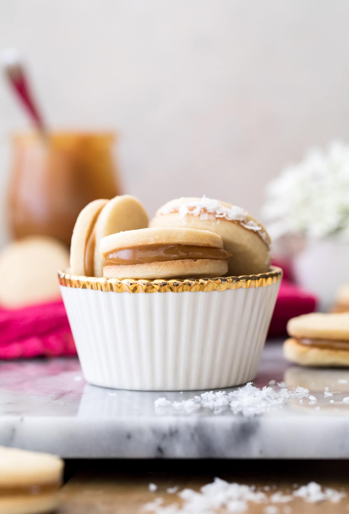 stack of alfajores in white cup