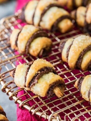 chocolate rugelach arranged on cooling rack