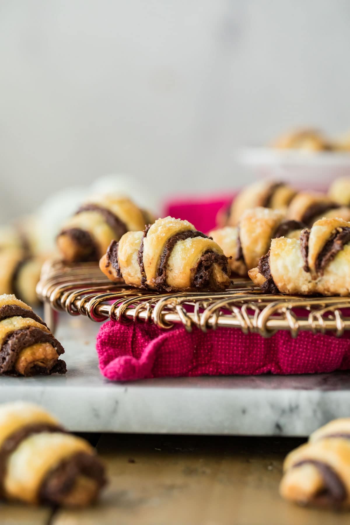 chocolate rugelach on gold cooling rack
