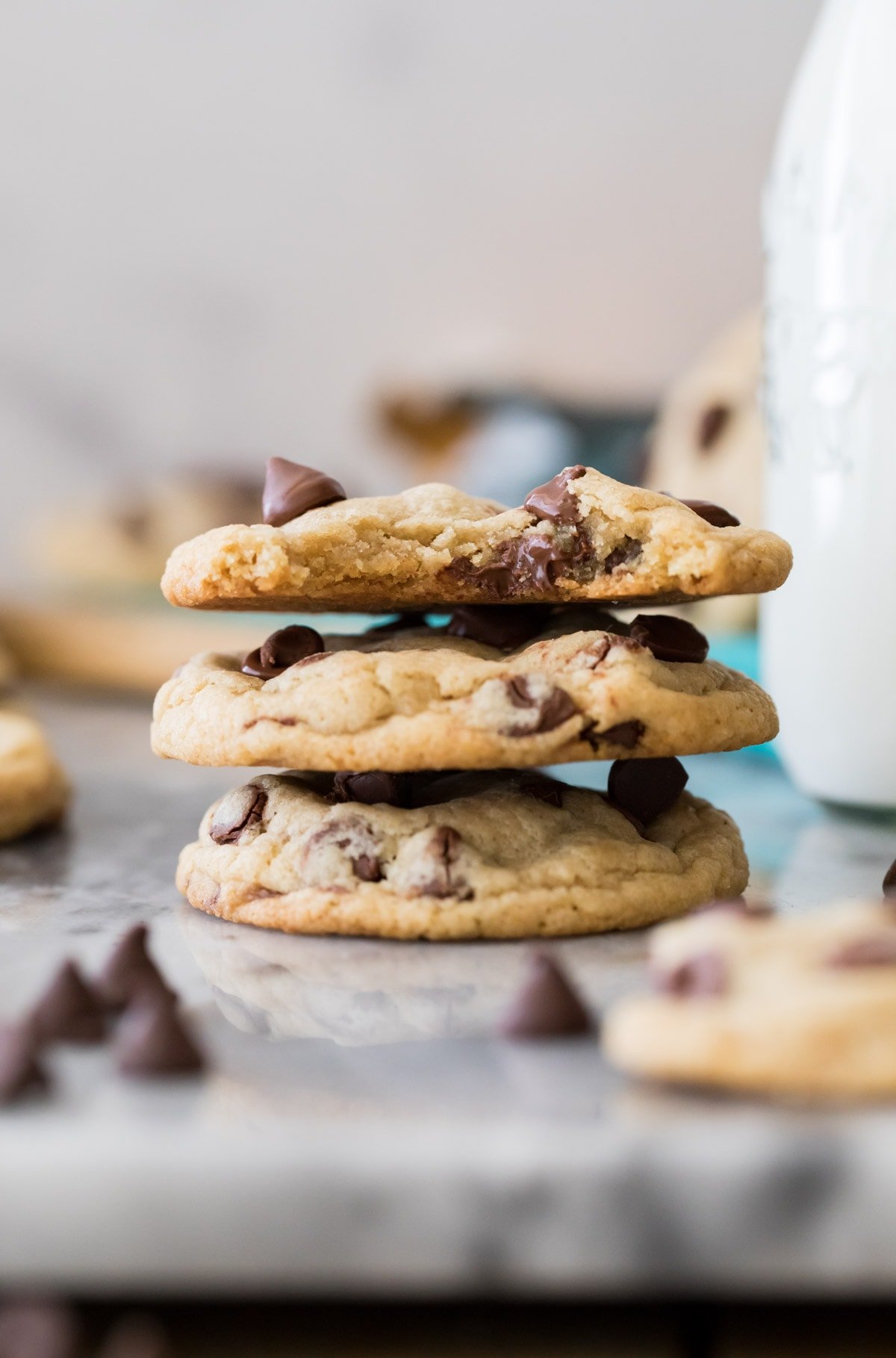 stack of three eggless chocolate chip cookies