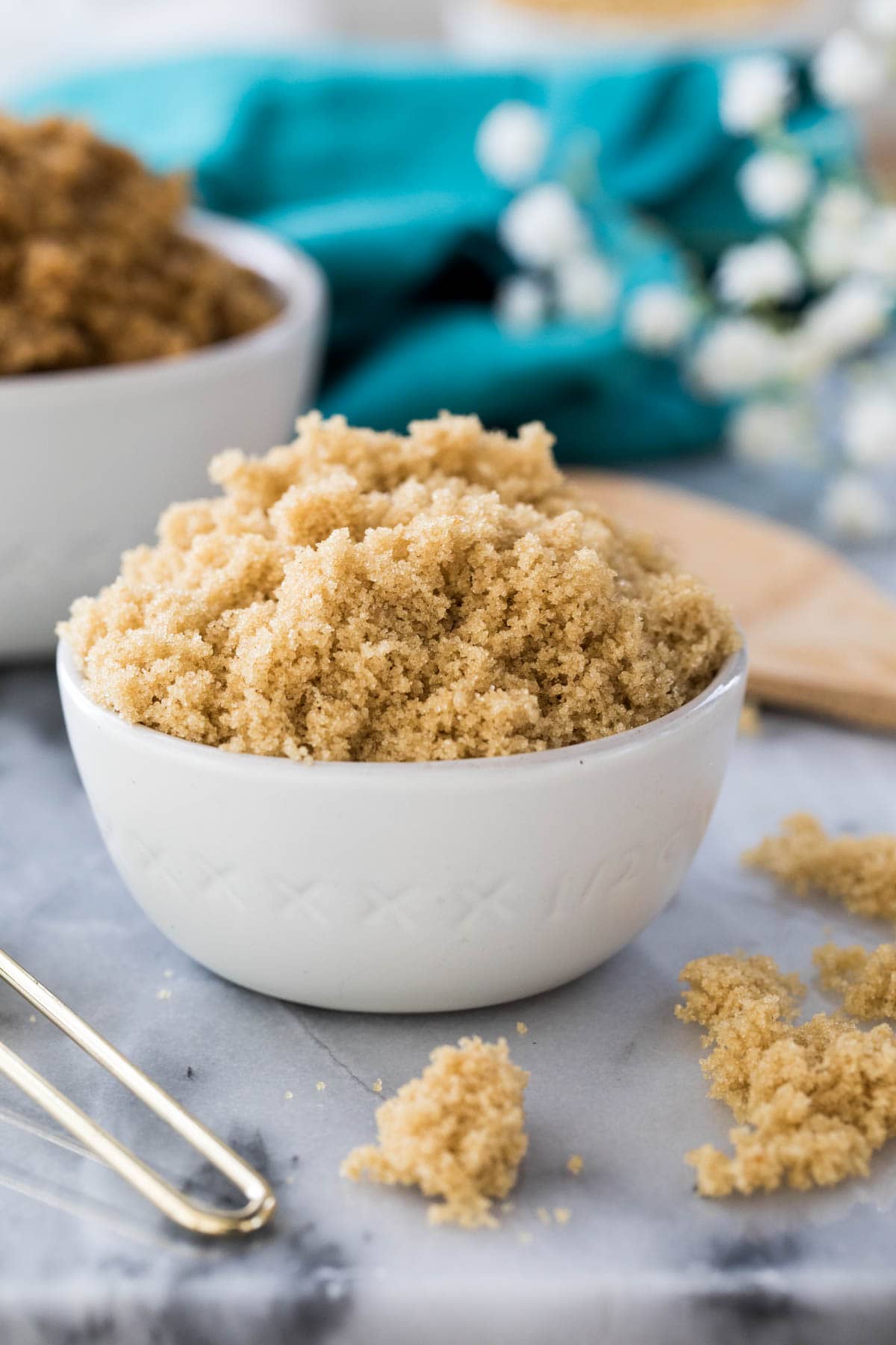 Light brown sugar in a white bowl