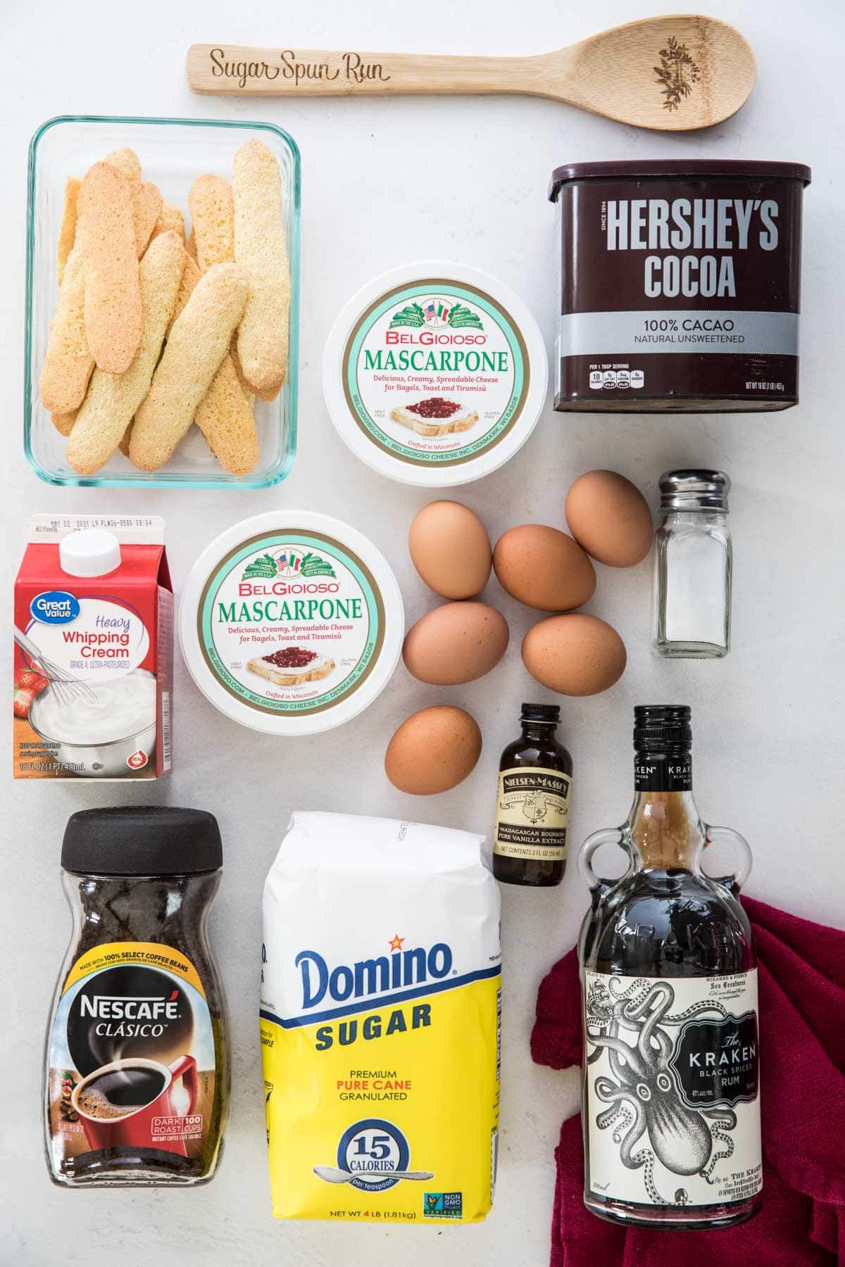 ingredients for tiramisu: ladyfingers, mascarpone, cocoa, cream, eggs, salt, vanilla, instant coffee, sugar, rum